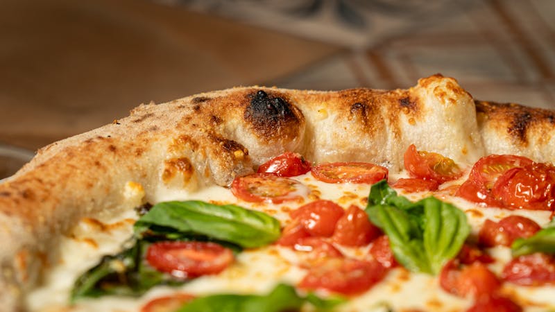 BBQ chicken pizza with fresh toppings